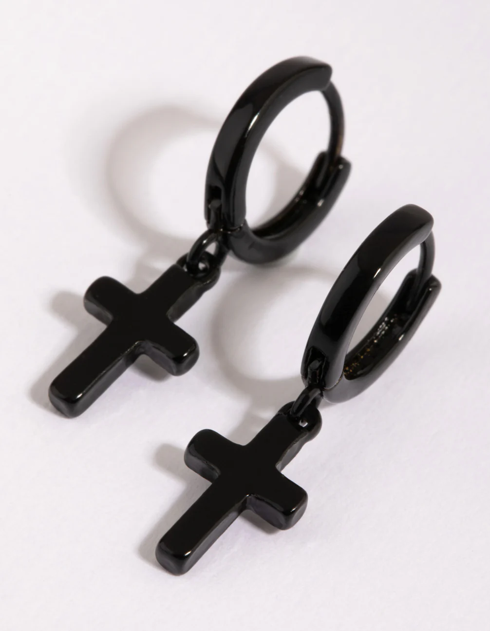 Black Brass Cross Huggie Earring - Image 3